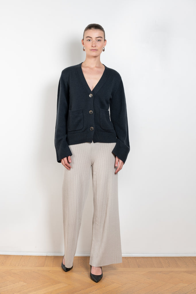 The Danni Cardigan by LISA YANG has extended sleeves for a feminine look, accentuated by patch pockets, ribbed trims and dropped shoulders