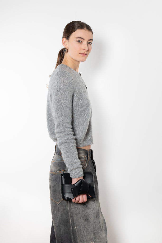 The Felicia Cardigan by Lisa Yang is a round neck cardigan with a boxy fit in a soft textured cashmere silk