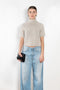 The Fride Sweater by LISA YANG has a standing mock-neck, with flattering, slim short sleeves and a cropped, regular fit.