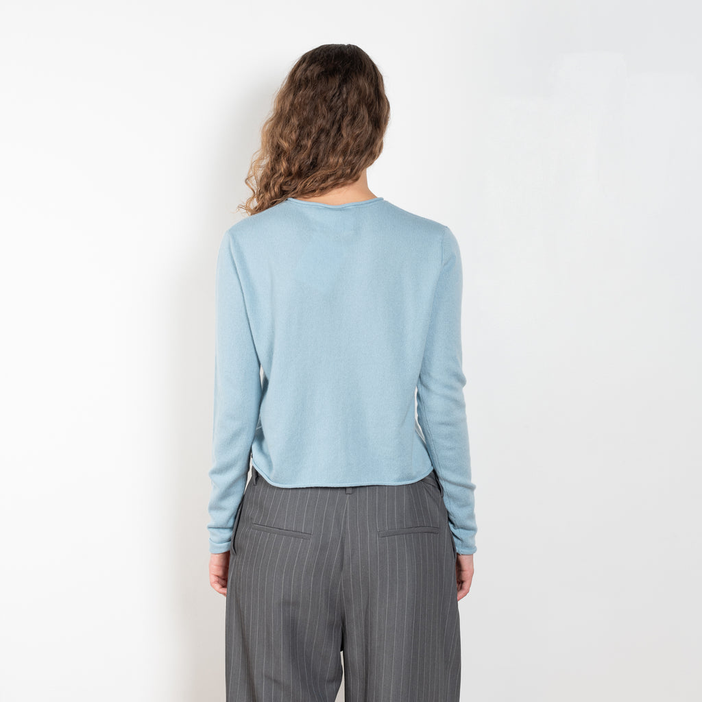 The Ida Sweater by Lisa Yang is a fine 12gg cashmere knit with a round neck and rolled edges