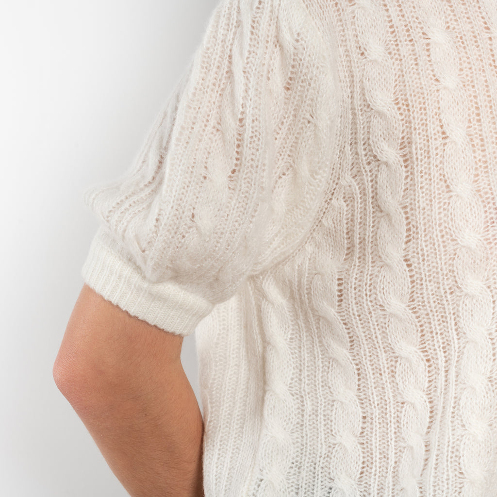 The Kenzie Sweater by Lisa Yang is a softly voluminous cable knit top in a delicate silk cashmere blend.