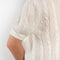 The Kenzie Sweater by Lisa Yang is a softly voluminous cable knit top in a delicate silk cashmere blend.