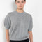 The Kenzie Sweater Sweater by Lisa Yang is a softly voluminous cable knit top in a delicate silk cashmere blend.