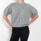 The Kenzie Sweater Sweater by Lisa Yang is a softly voluminous cable knit top in a delicate silk cashmere blend.