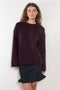 The Kristy Sweater by Lisa Yang is a 5 gauge cashmere relaxed knit with a longline silhouette and crewneck crafted in a heavy knit cashmere with a textured hand feel