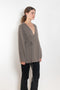 The Laurina Wrap Cardigan is a refined and feminine cashmere knit wrap cardigan with a tied waist