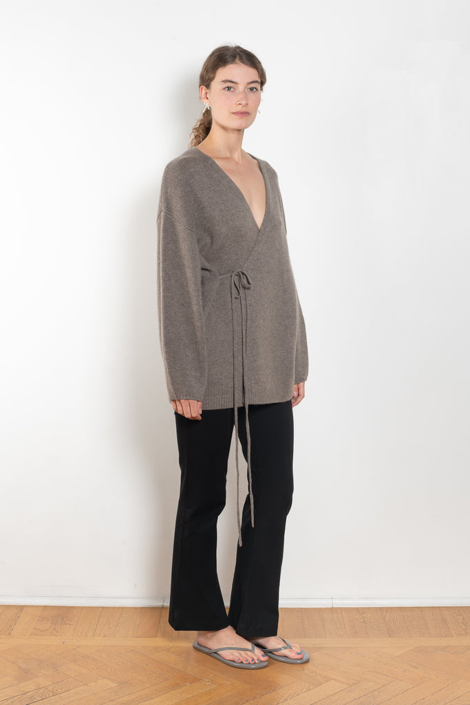 The Laurina Wrap Cardigan is a refined and feminine cashmere knit wrap cardigan with a tied waist