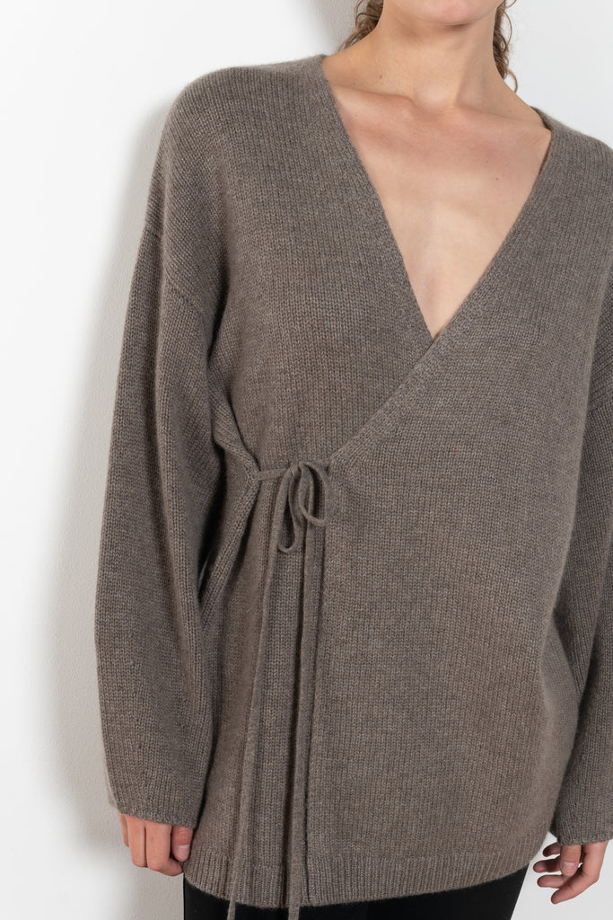 The Laurina Wrap Cardigan is a refined and feminine cashmere knit wrap cardigan with a tied waist