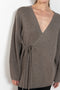 The Laurina Wrap Cardigan is a refined and feminine cashmere knit wrap cardigan with a tied waist