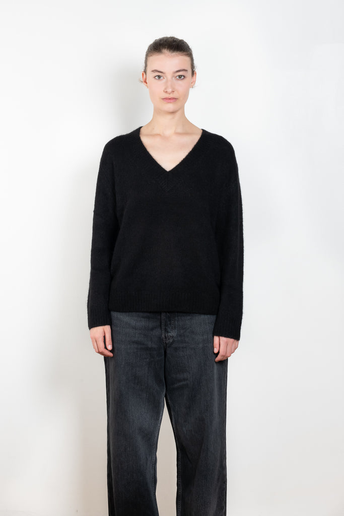 The Leona Sweater by Lisa Yang is a V-neck sweater with dropped shoulders in a textured cashmere silk