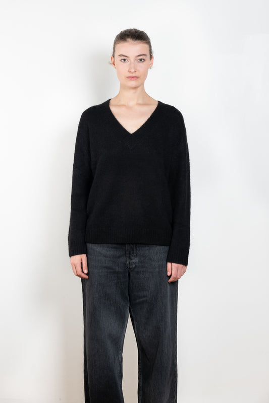 The Leona Sweater by Lisa Yang is a V-neck sweater with dropped shoulders in a textured cashmere silk