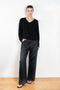 The Leona Sweater by Lisa Yang is a V-neck sweater with dropped shoulders in a textured cashmere silk