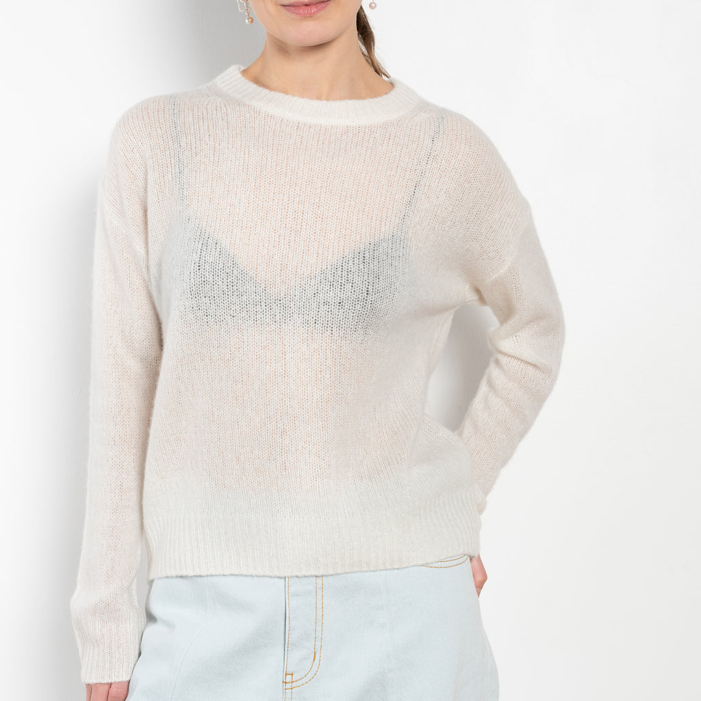 The Lova Sweater by Lisa Yang is a round neck sweater with a relaxed fit in a soft textured cashmere silk blend