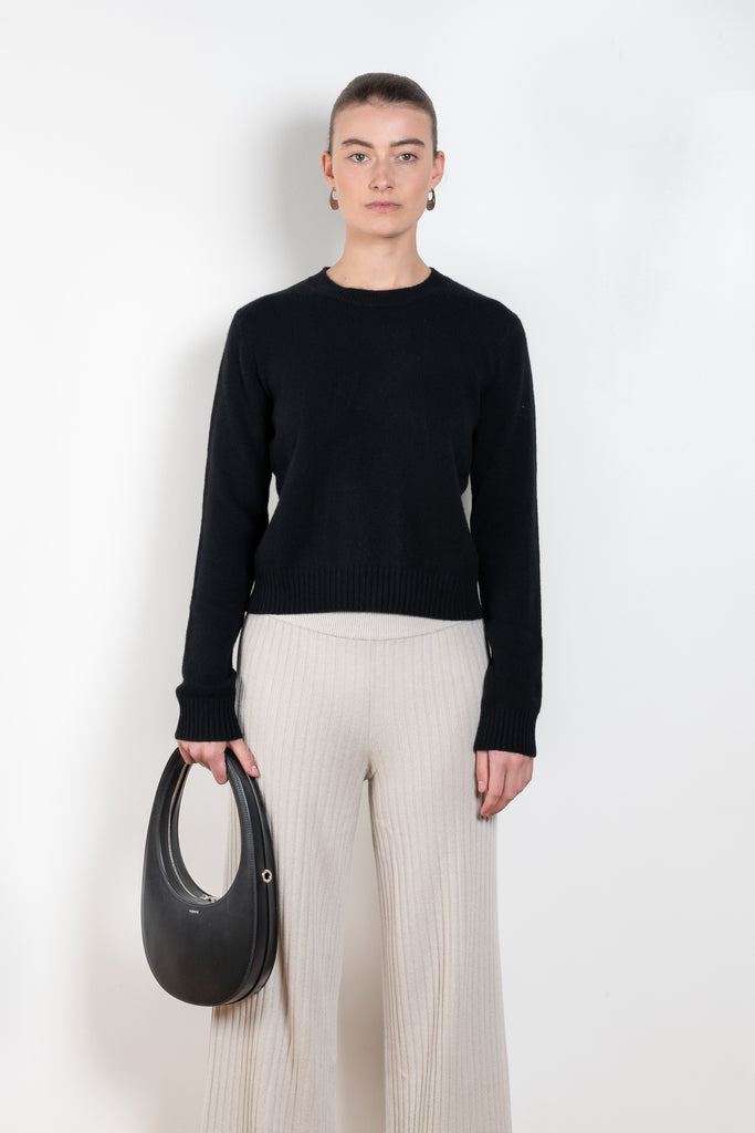 The Mable Sweater by Lisa Yang is a signature fitted cashmere sweater with ribbed trims, a comfortable round neck and long sleeves