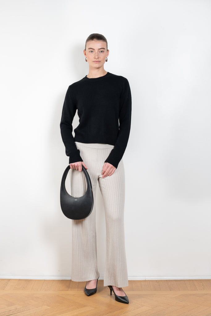 The Mable Sweater by Lisa Yang is a signature fitted cashmere sweater with ribbed trims, a comfortable round neck and long sleeves