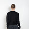 The Marionette Cardigan by Lisa Yang is a V-neck cardigan with a boxy fit in a soft textured cashmere silk