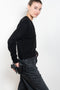 The Marionette Cardigan by Lisa Yang is a V-neck cardigan with a boxy fit in a soft textured cashmere silk blend