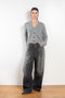 The Marionette Cardigan by Lisa Yang is a V-neck cardigan with a boxy fit in a soft textured cashmere silk blend