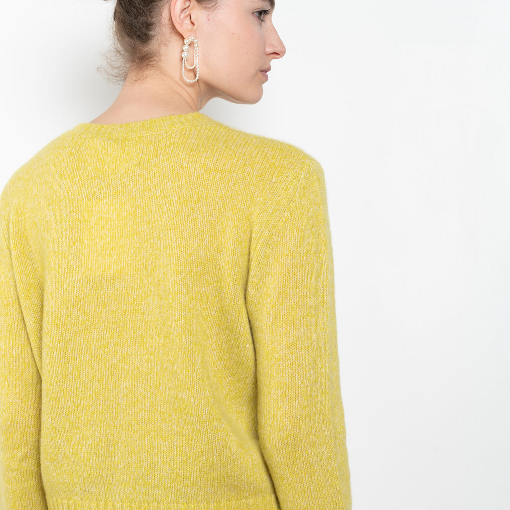 The Mira Sweater by Lisa Yang is a round neck sweater with a fitted silhouette in a soft textured cashmere silk