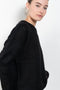 The Mira Sweater by Lisa Yang is a round neck sweater with a fitted silhouette in a soft textured cashmere silk