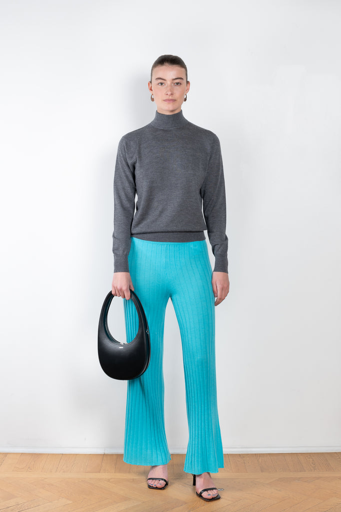 The Ophelia Sweater by Lisa Yang is a fine cashmere knit with a fitted shape and high neck