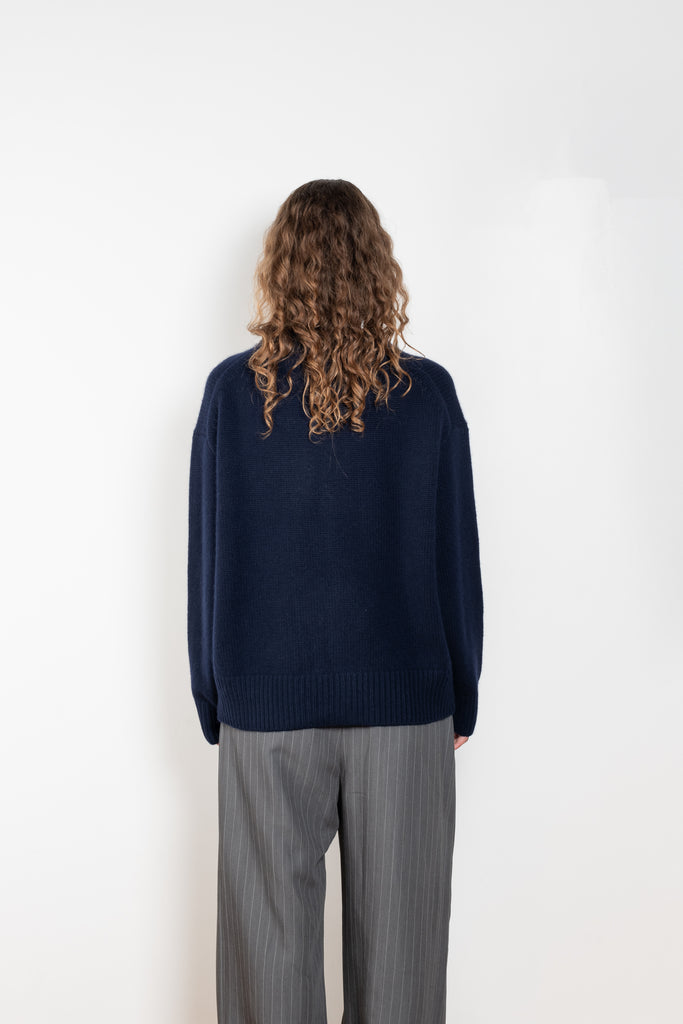 The Renske Sweater by Lisa Yang is a knitted in a 5 gauge plain-knit cashmere with a round neck, elongated sleeves & ribbed trims