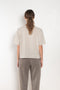 The Cila Tee by LISA YANG is a fine knit cashmere t-shirt with a classic round neck and rolled trim edges
