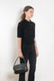 The Masy Polo Sweater by Lisa Yang is a polo sweater with a relaxed fit in a soft textured cashmere silk blend