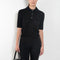 The Masy Polo Sweater by Lisa Yang is a polo sweater with a relaxed fit in a soft textured cashmere silk blend