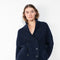 The Annalike Cardigan Jacket by Lisa Yang is a cardigan vest in a fisherman ribbed cashmere with a shawl-neck collar