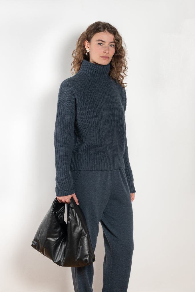 The Julina Sweater by LISA YANG is a chuncky cashmere ribbed sweater with a high neck and straight fit