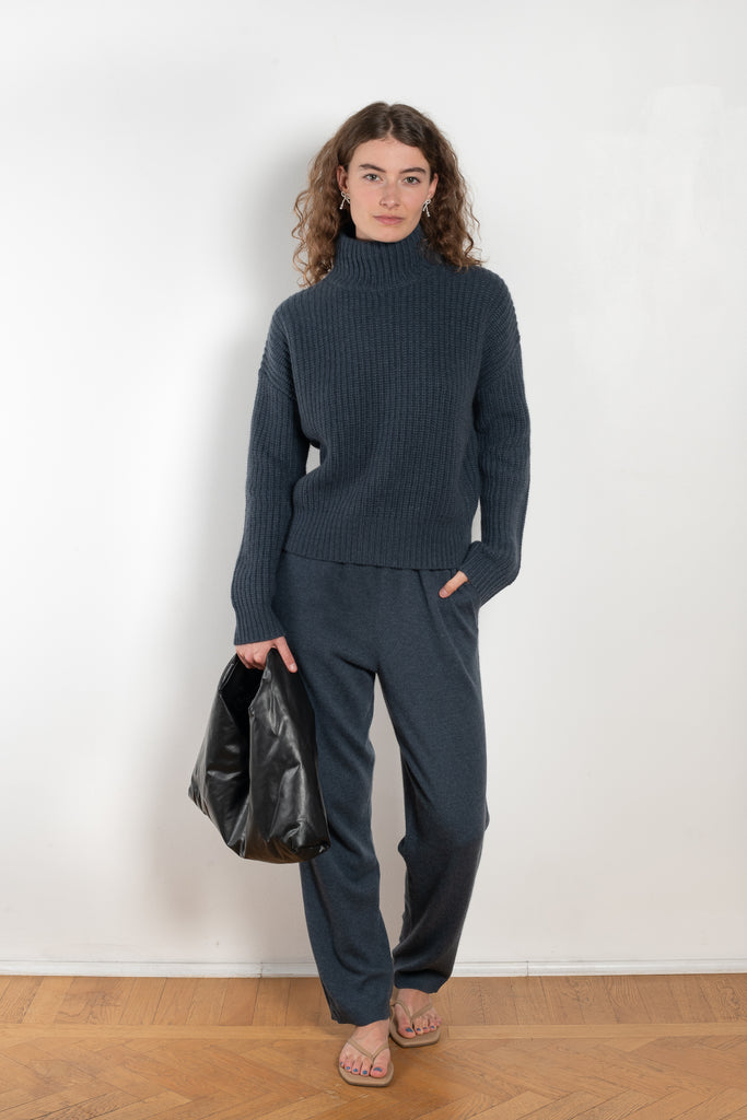 The Julina Sweater by LISA YANG is a chuncky cashmere ribbed sweater with a high neck and straight fit