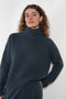 The Julina Sweater by LISA YANG is a chuncky cashmere ribbed sweater with a high neck and straight fit