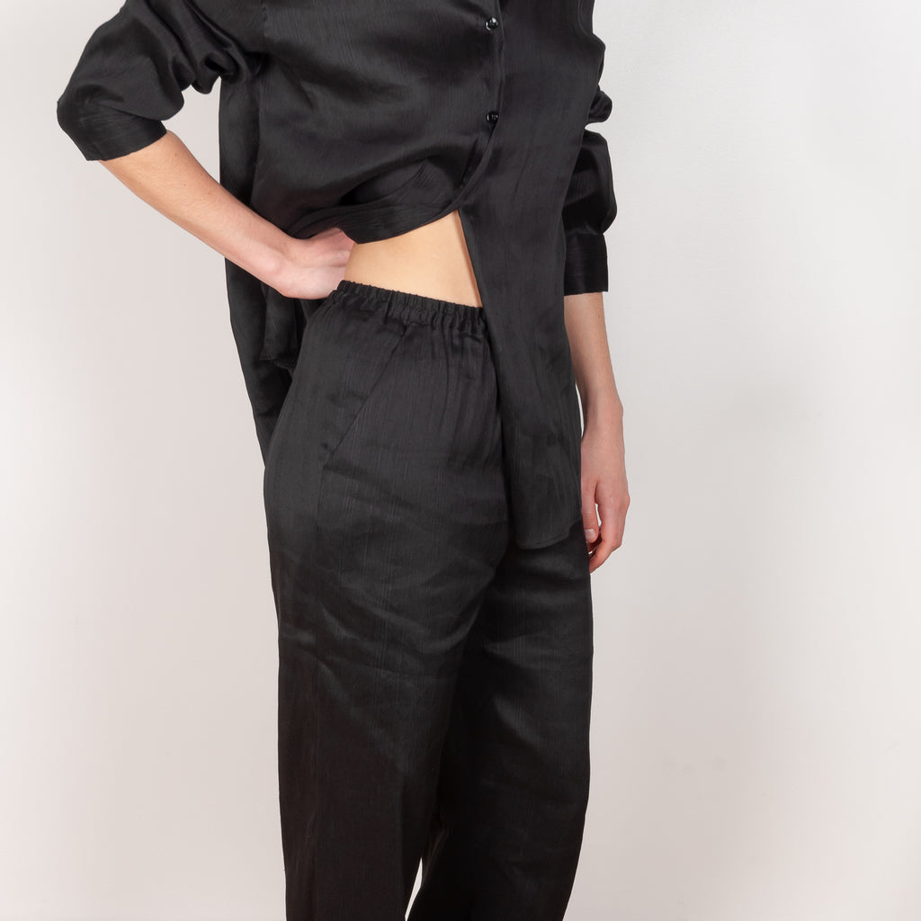 The Amata Pants by Loulou Studio are made of a linen, silk blend