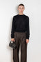 The Angus Sweater by Loulou Studio is fine cashmere knit with a round neck and effortless body, the perfect layering piece.