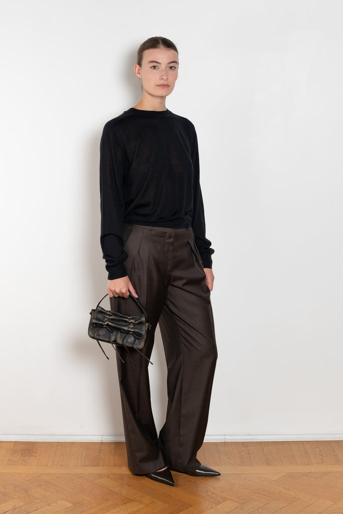 The Angus Sweater by Loulou Studio is fine cashmere knit with a round neck and effortless body, the perfect layering piece.