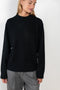 The Baltra Sweater by Loulou Studio is a relaxed long sleeve sweater in a soft cashmere