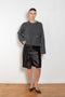 The Bill Sweater by Loulou Studio is thick soft cashmere sweater with a draped detail and an hardware embellishment
