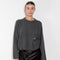 The Bill Sweater by Loulou Studio is thick soft cashmere sweater with a draped detail and an hardware embellishment