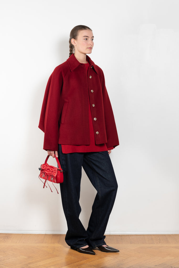 The Camila Coat by Loulou Studio has a ample fit with a back flap