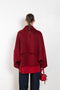 The Camila Coat by Loulou Studio has a ample fit with a back flap