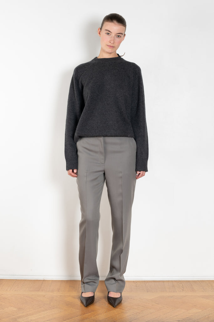 The Kallisto Twill Pants by Loulou Studio are viscose mohair twill trousers with a mid rise and long tapered leg