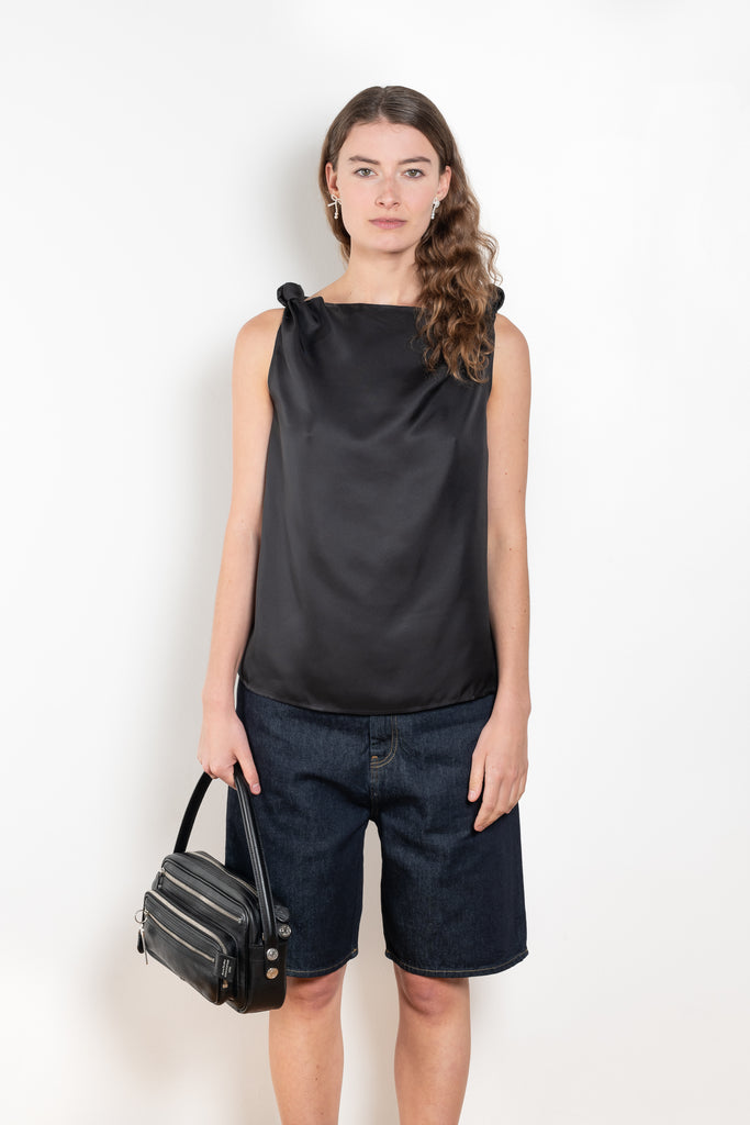 The Remy Top by Loulou Studio is a cotton silk twill top with a drape knot detail on the shoulders