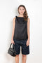 The Remy Top by Loulou Studio is a cotton silk twill top with a drape knot detail on the shoulders