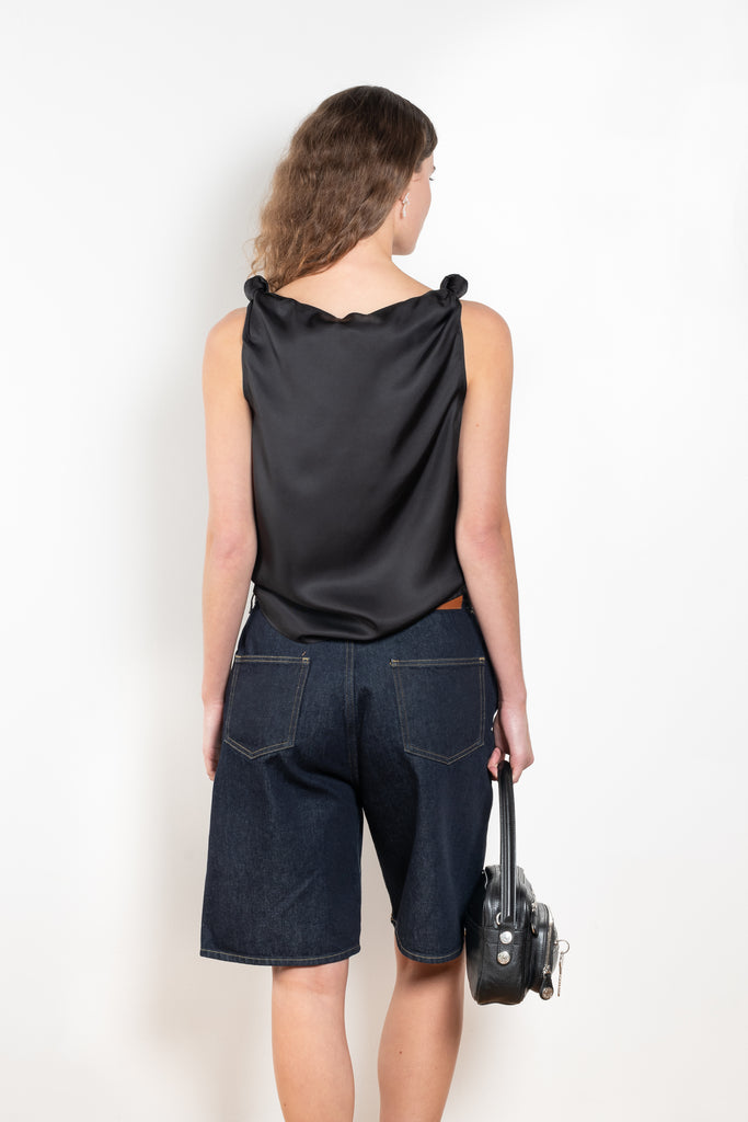 The Remy Top by Loulou Studio is a cotton silk twill top with a drape knot detail on the shoulders