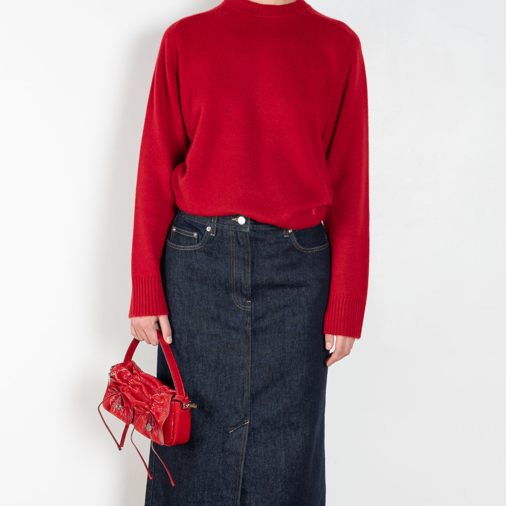 The Rona Skirt by Loulou Studio is a mid rise jeans skirt with a straight silhouette