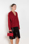 The Sage Sweater by Loulou Studio is an oversized sweater with an ample fit, a deep V, dropped shoulders and ribbed details in a thicker cashmere