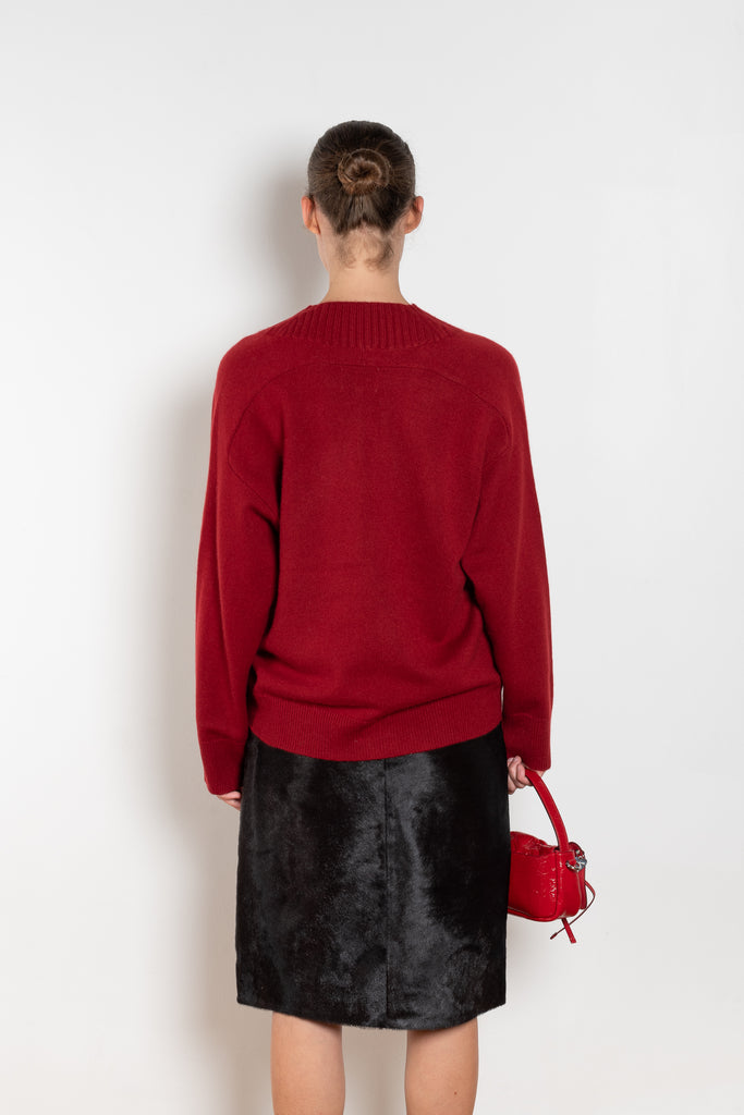 The Sage Sweater by Loulou Studio is an oversized sweater with an ample fit, a deep V, dropped shoulders and ribbed details in a thicker cashmere