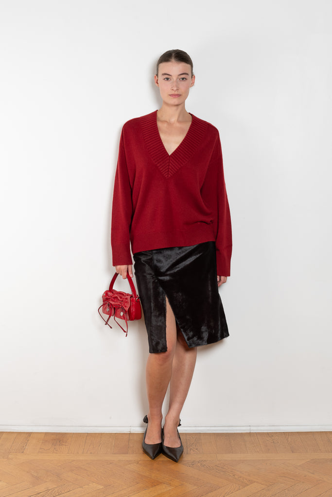 The Sage Sweater by Loulou Studio is an oversized sweater with an ample fit, a deep V, dropped shoulders and ribbed details in a thicker cashmere