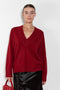 The Sage Sweater by Loulou Studio is an oversized sweater with an ample fit, a deep V, dropped shoulders and ribbed details in a thicker cashmere